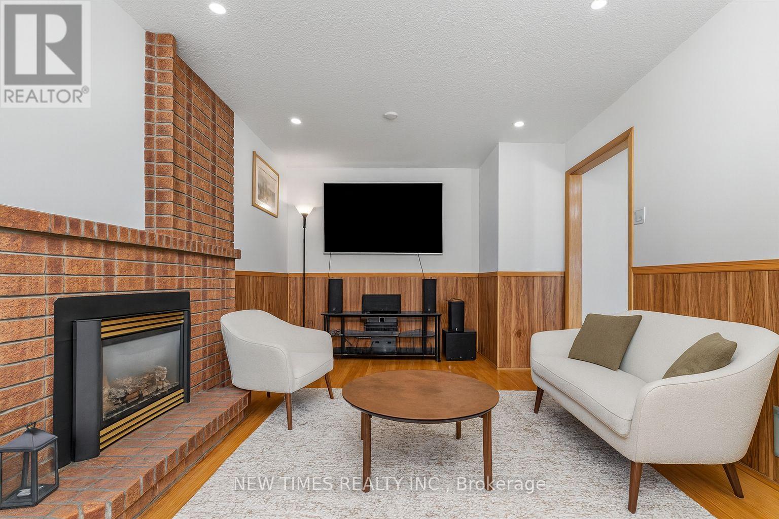 19 Coverdale Crescent, Toronto, ON - Indoor Photo Showing Living Room With Fireplace