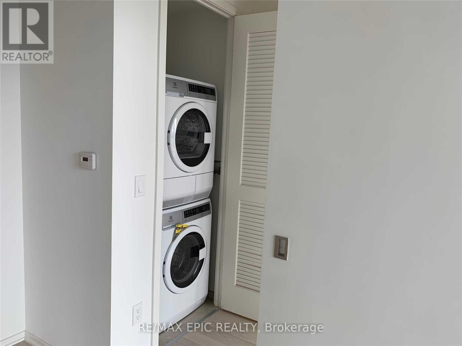 2103 - 16 Bonnycastle Street, Toronto, ON - Indoor Photo Showing Laundry Room