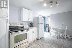 Main floor kitchen (another kitchen upstairs!) -