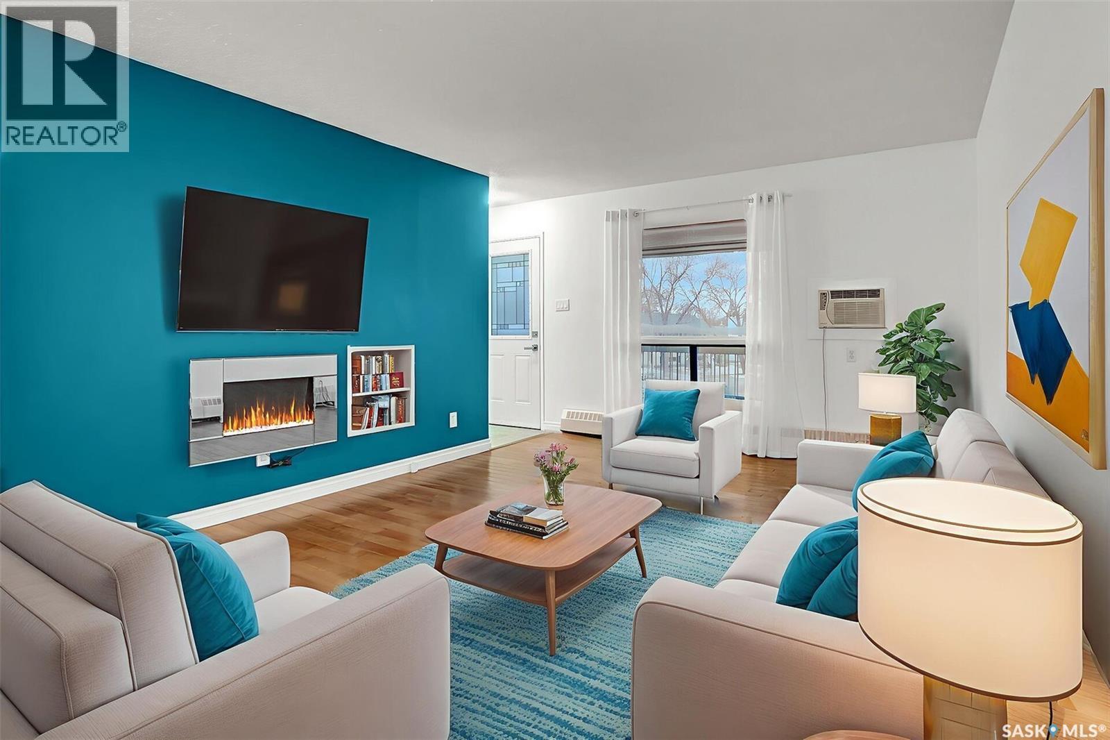 54B Nollet Avenue, Regina, SK - Indoor Photo Showing Living Room With Fireplace