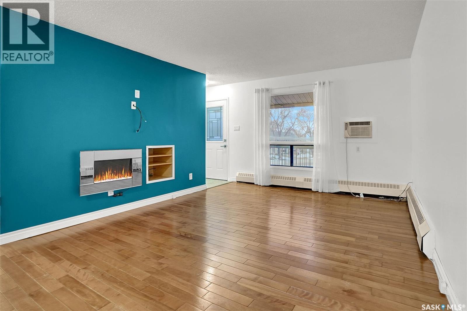 54B Nollet Avenue, Regina, SK - Indoor With Fireplace