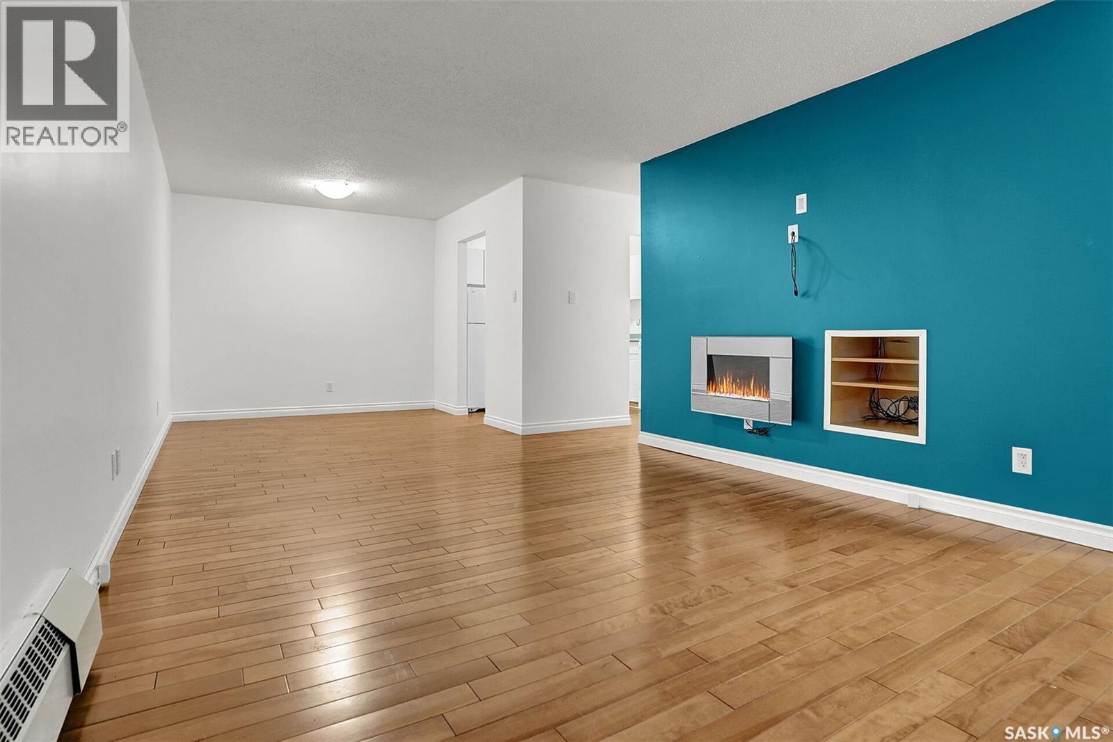 54B Nollet Avenue, Regina, SK - Indoor With Fireplace