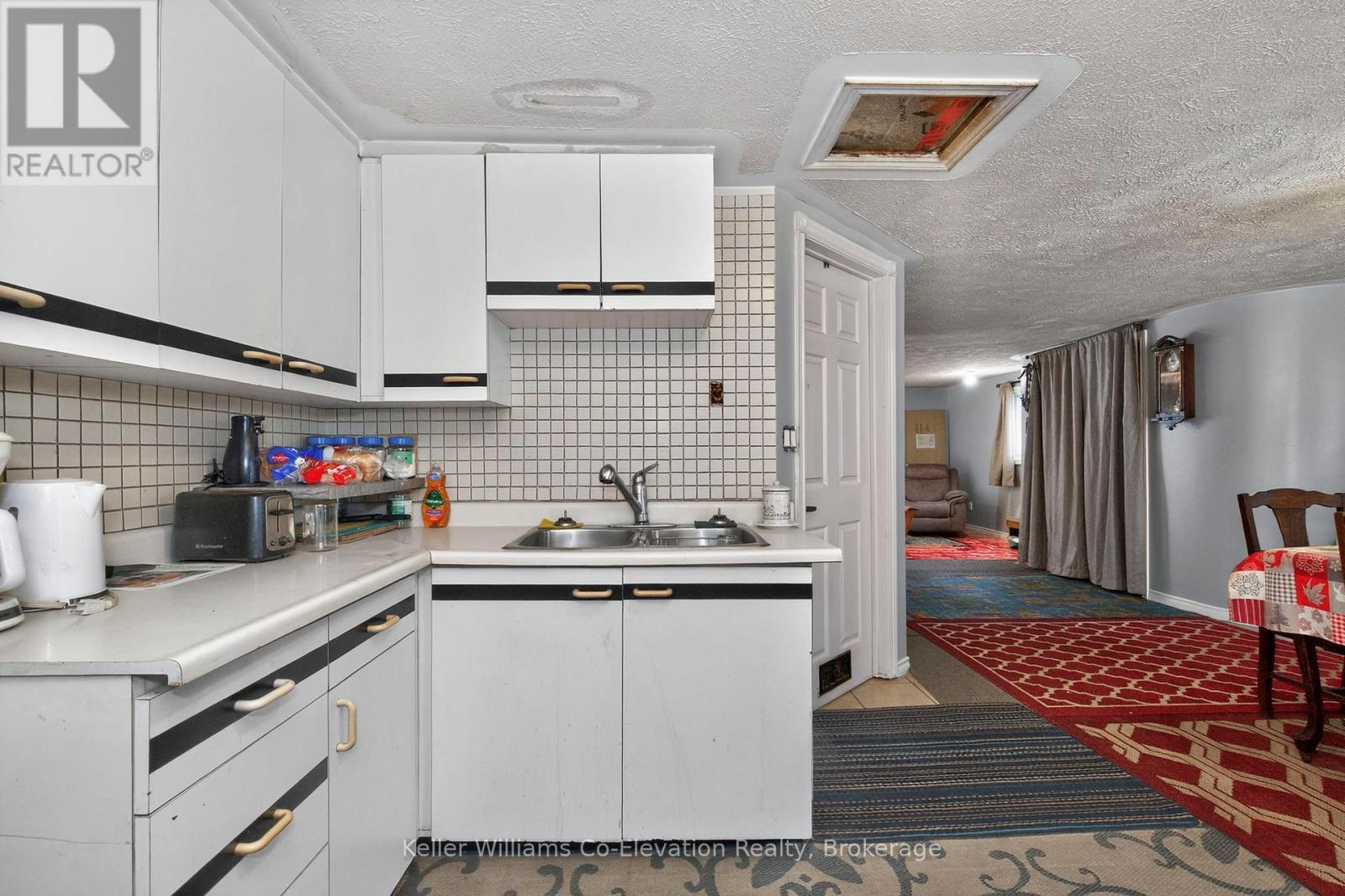 332 Wardell Street, Tay (Port Mcnicoll), ON - Indoor Photo Showing Kitchen With Double Sink