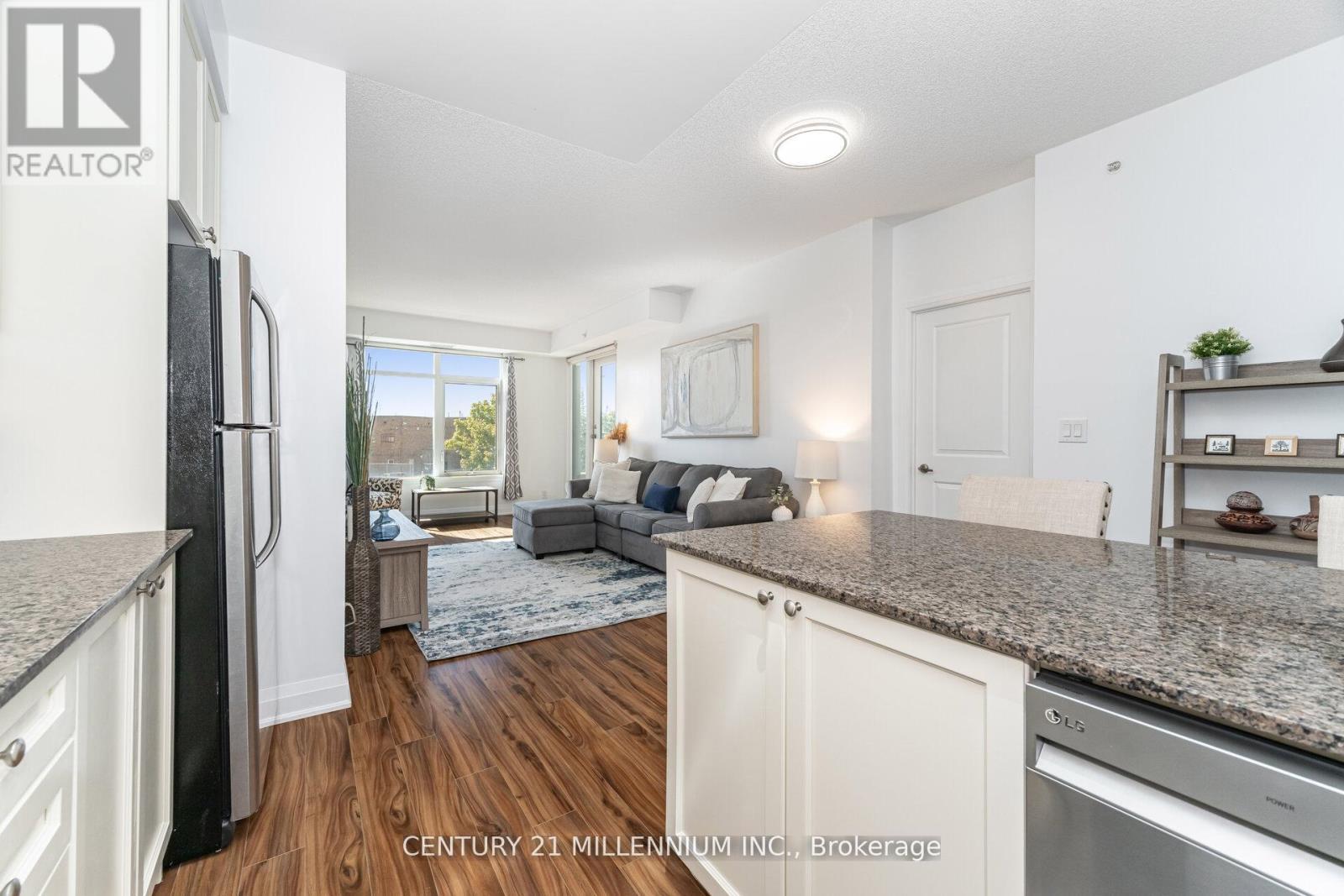 217 - 24 Woodstream Boulevard, Vaughan, ON - Indoor Photo Showing Kitchen With Upgraded Kitchen