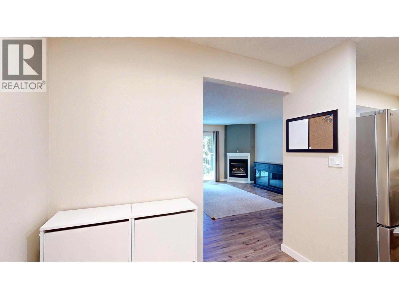 1802 Alpine Drive Unit# 302B, Elkford, BC - Indoor With Fireplace