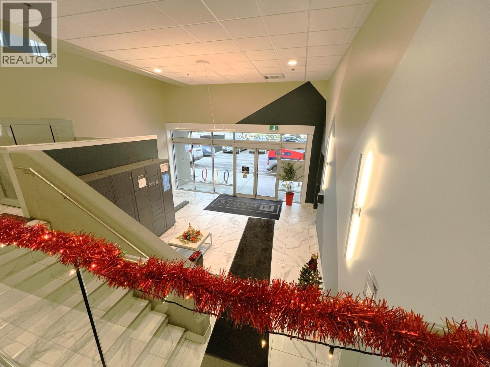 Main Building Foyer, Wheel Chair Lift - 925 Leon Avenue Unit# 407, Kelowna, BC - Indoor Photo Showing Other Room