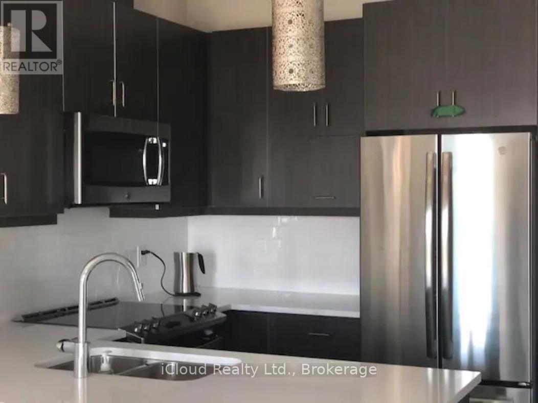 633 - 128 Grovewood Common, Oakville, ON - Indoor Photo Showing Kitchen With Stainless Steel Kitchen With Upgraded Kitchen