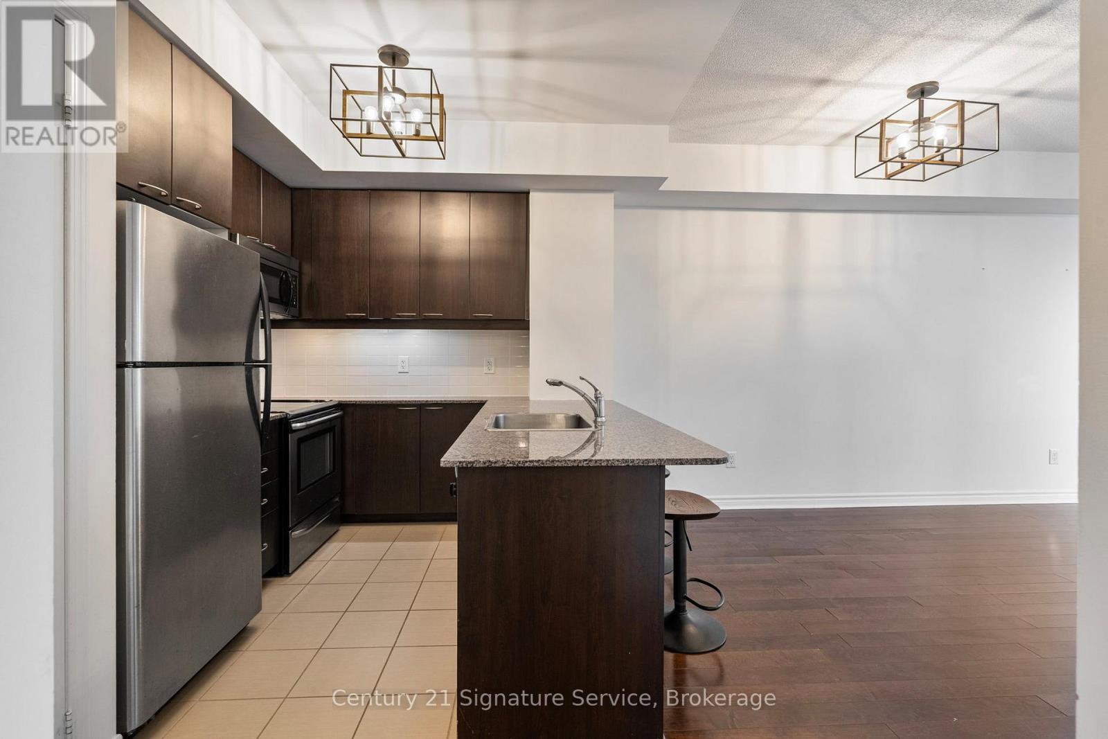2001 - 385 Prince Of Wales Drive, Mississauga, ON - Indoor Photo Showing Kitchen With Stainless Steel Kitchen With Double Sink