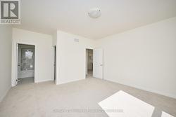 Primary bedroom w/ ensuites and w/in closet -