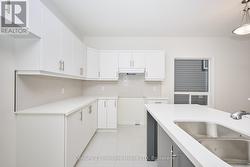 Bright kitchen with subway tile backsplash -