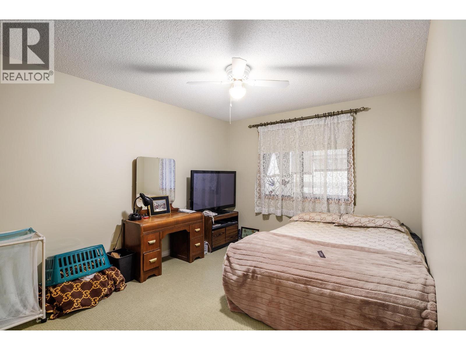 1035 Bernard Avenue Unit# 214 Lot# 29, Kelowna, BC - Indoor Photo Showing Bedroom