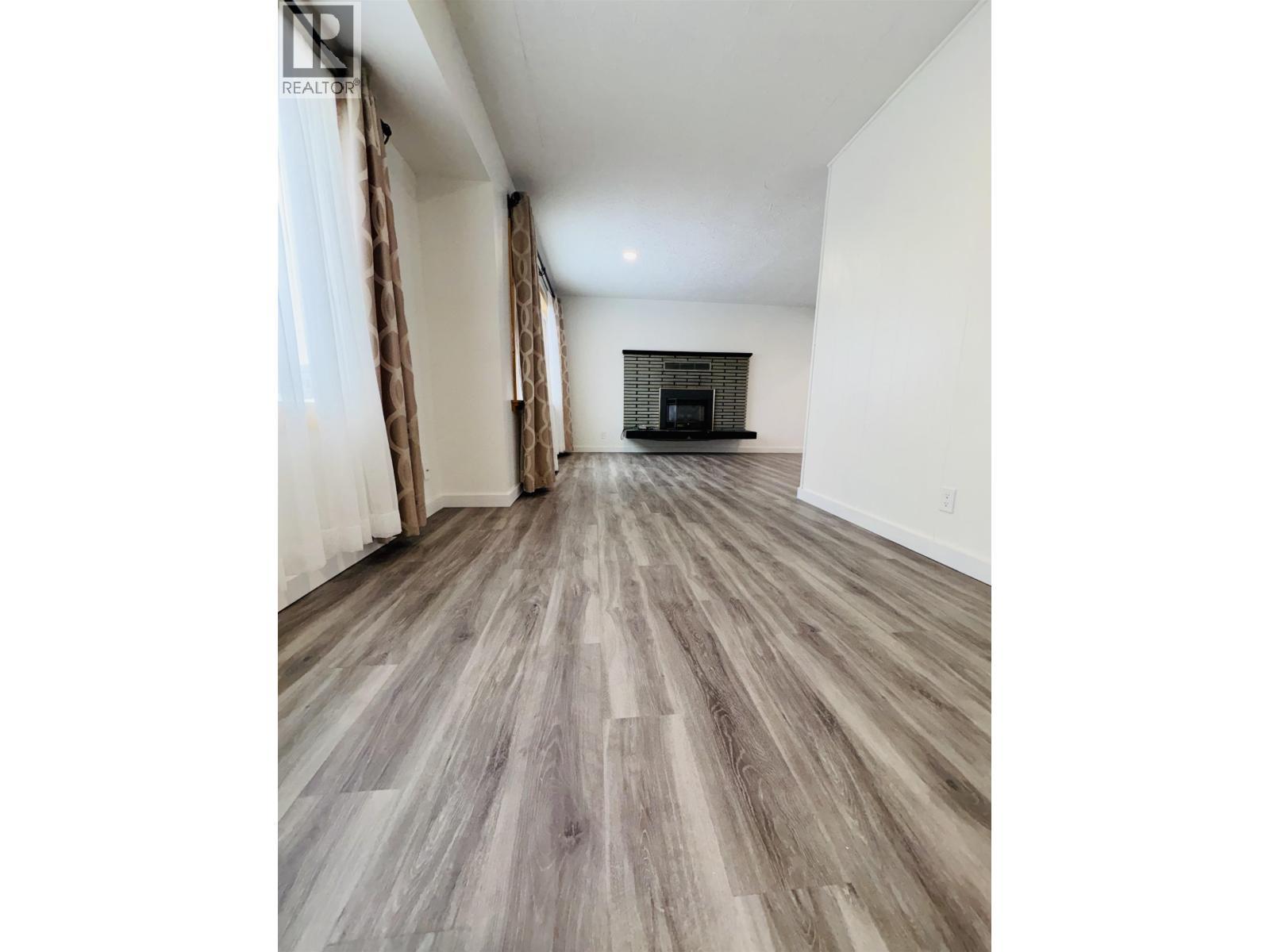 13 Wren Street, Kitimat, BC - Indoor Photo Showing Living Room With Fireplace