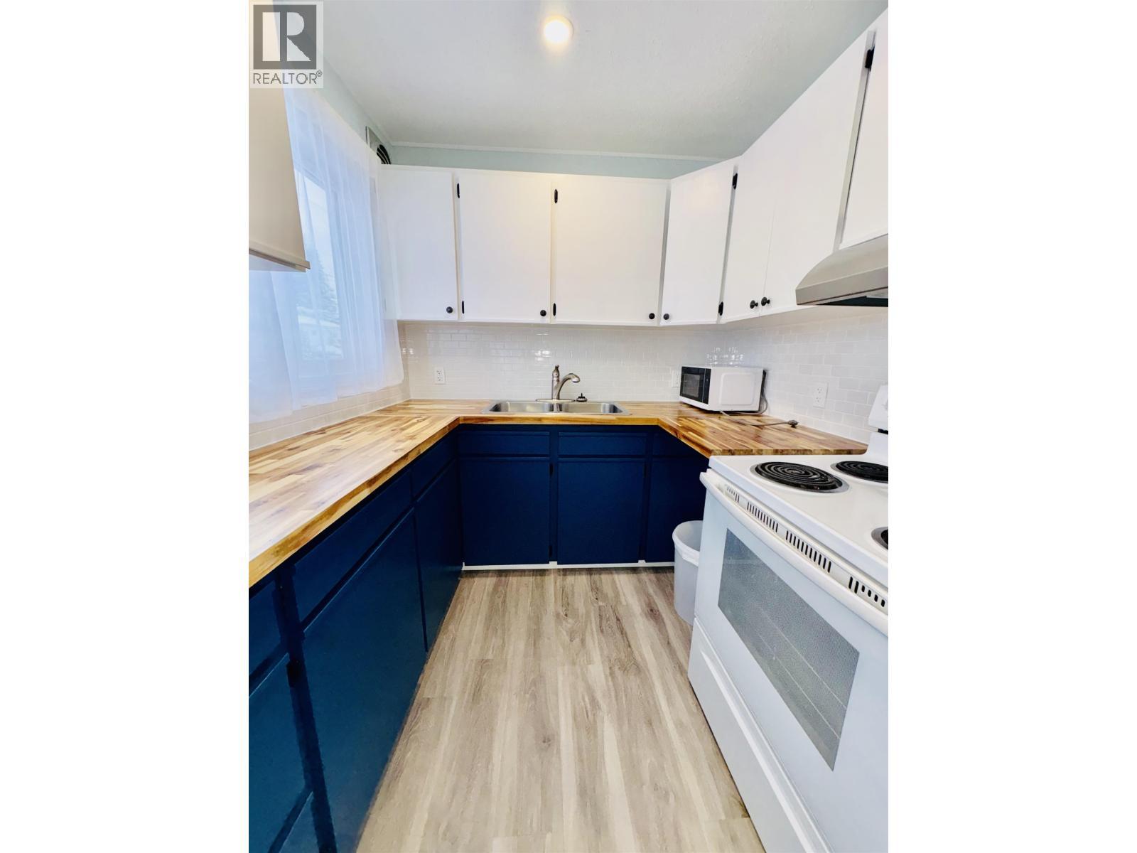13 Wren Street, Kitimat, BC - Indoor Photo Showing Kitchen With Double Sink