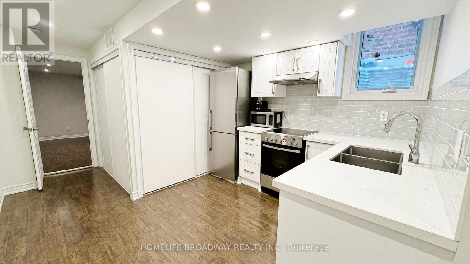 Lower - 102 Orchard Hill Boulevard, Markham, ON - Indoor Photo Showing Kitchen With Double Sink