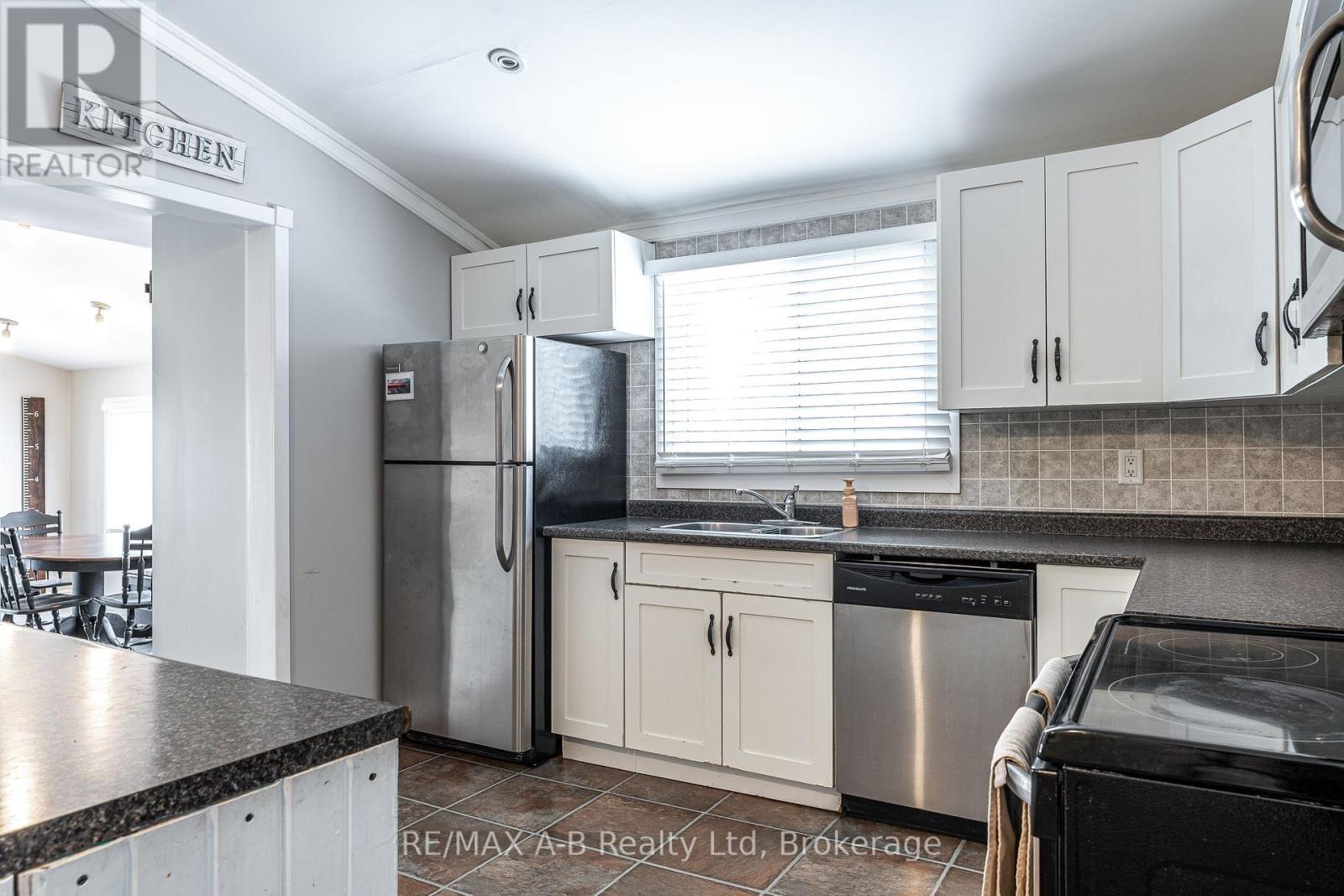 250 Orchard Avenue, Zorra, ON - Indoor Photo Showing Kitchen With Double Sink