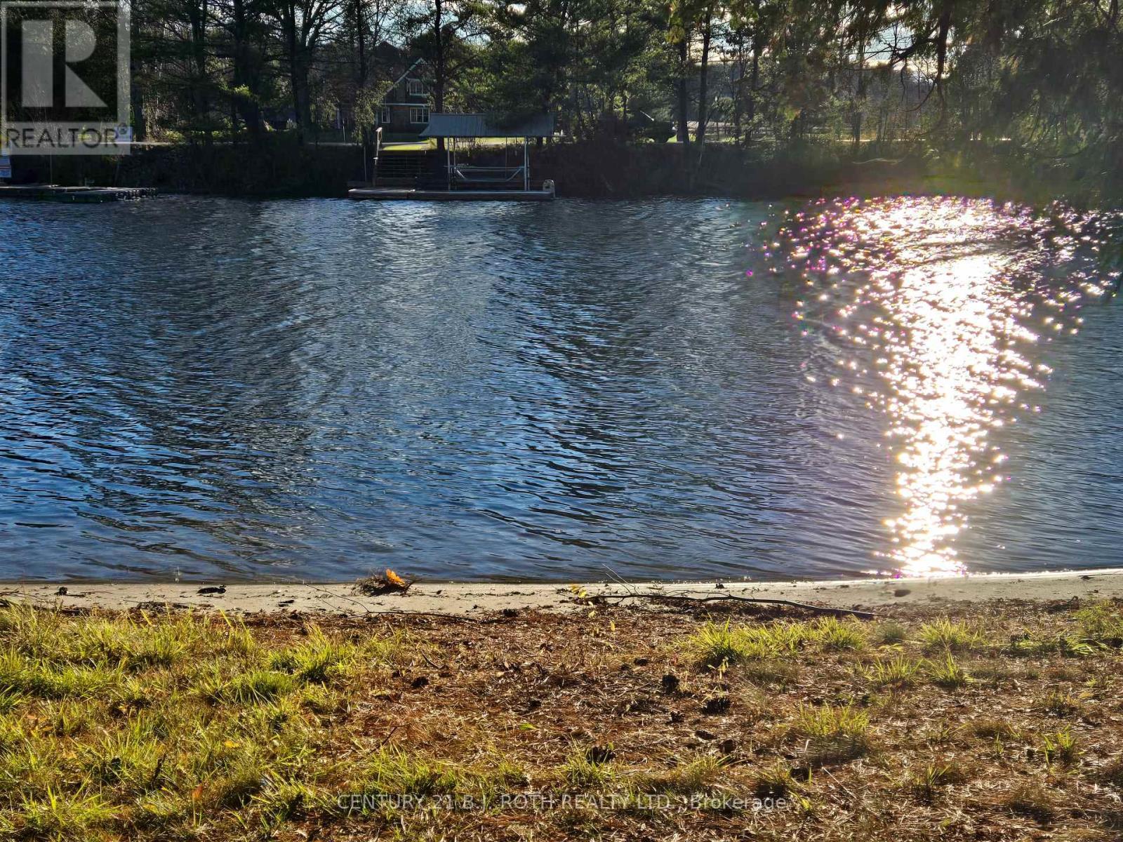 375 Santas Village Road, Bracebridge, ON - Outdoor With Body Of Water With View