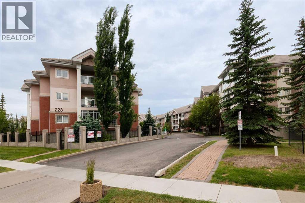 201, 223 Tuscany Springs Boulevard Nw, Calgary, AB - Outdoor With Facade