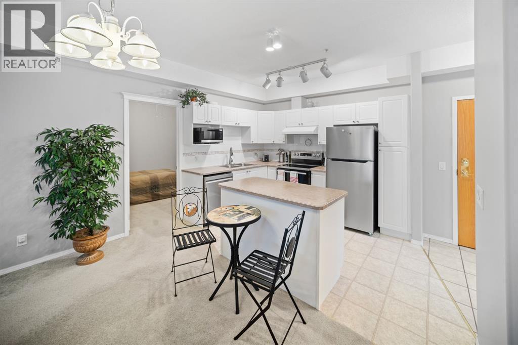201, 223 Tuscany Springs Boulevard Nw, Calgary, AB - Indoor Photo Showing Kitchen