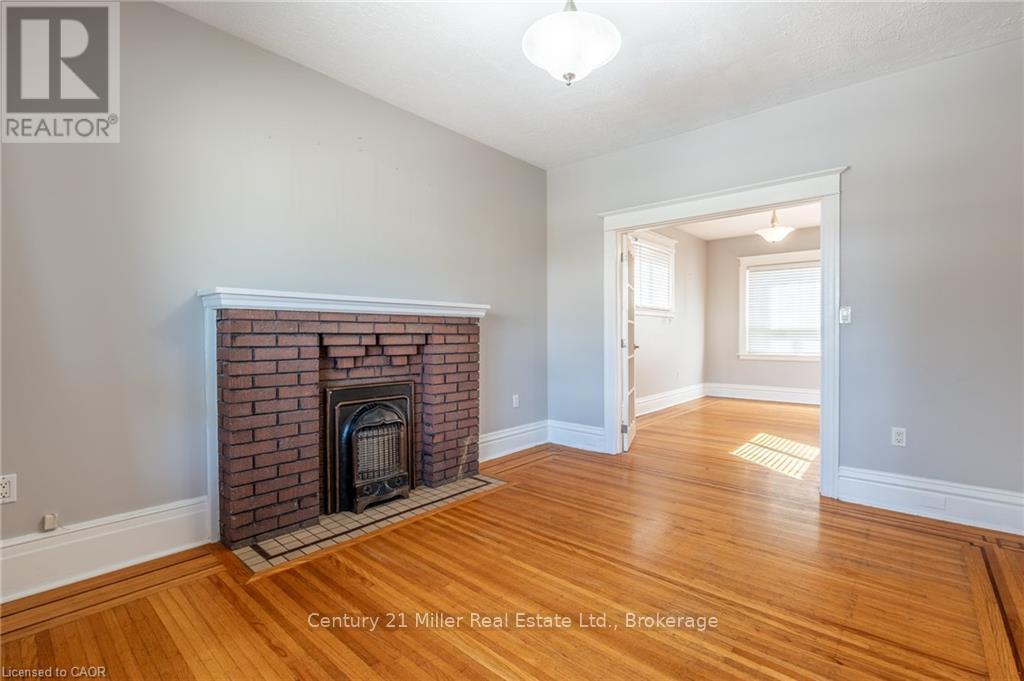Main - 39 Connaught Avenue N, Hamilton (Stipley), ON - Indoor Photo Showing Living Room With Fireplace
