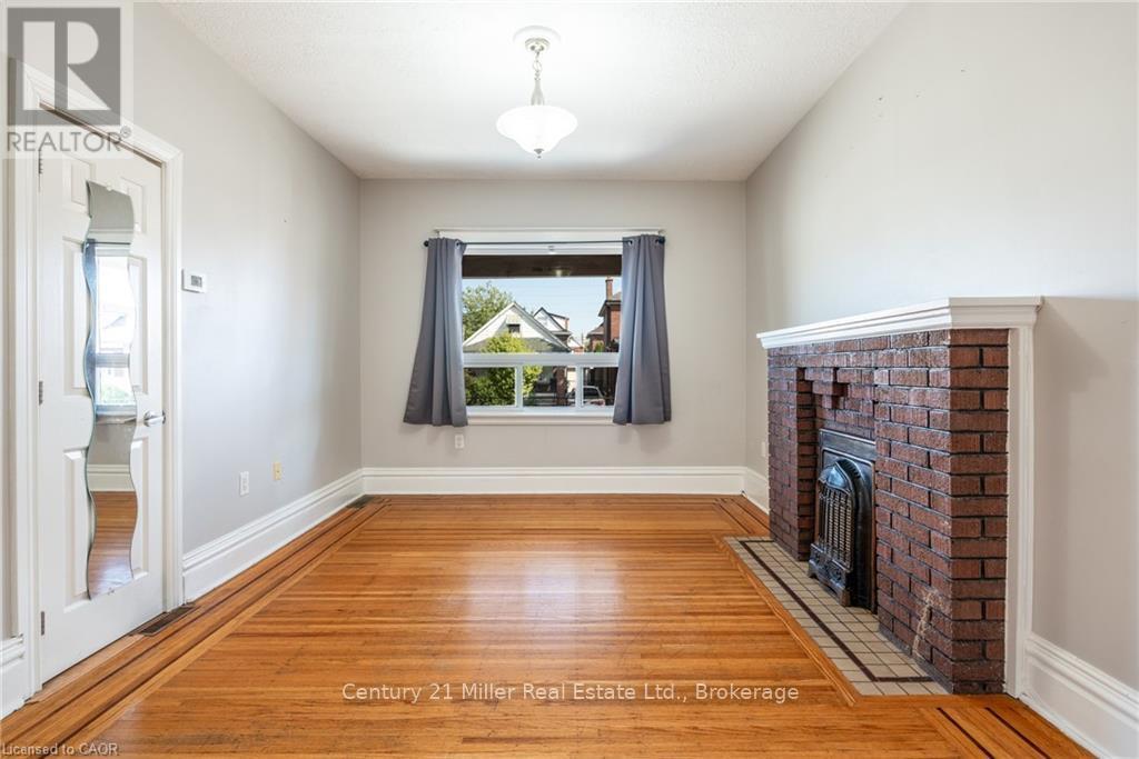 Main - 39 Connaught Avenue N, Hamilton (Stipley), ON - Indoor Photo Showing Other Room With Fireplace