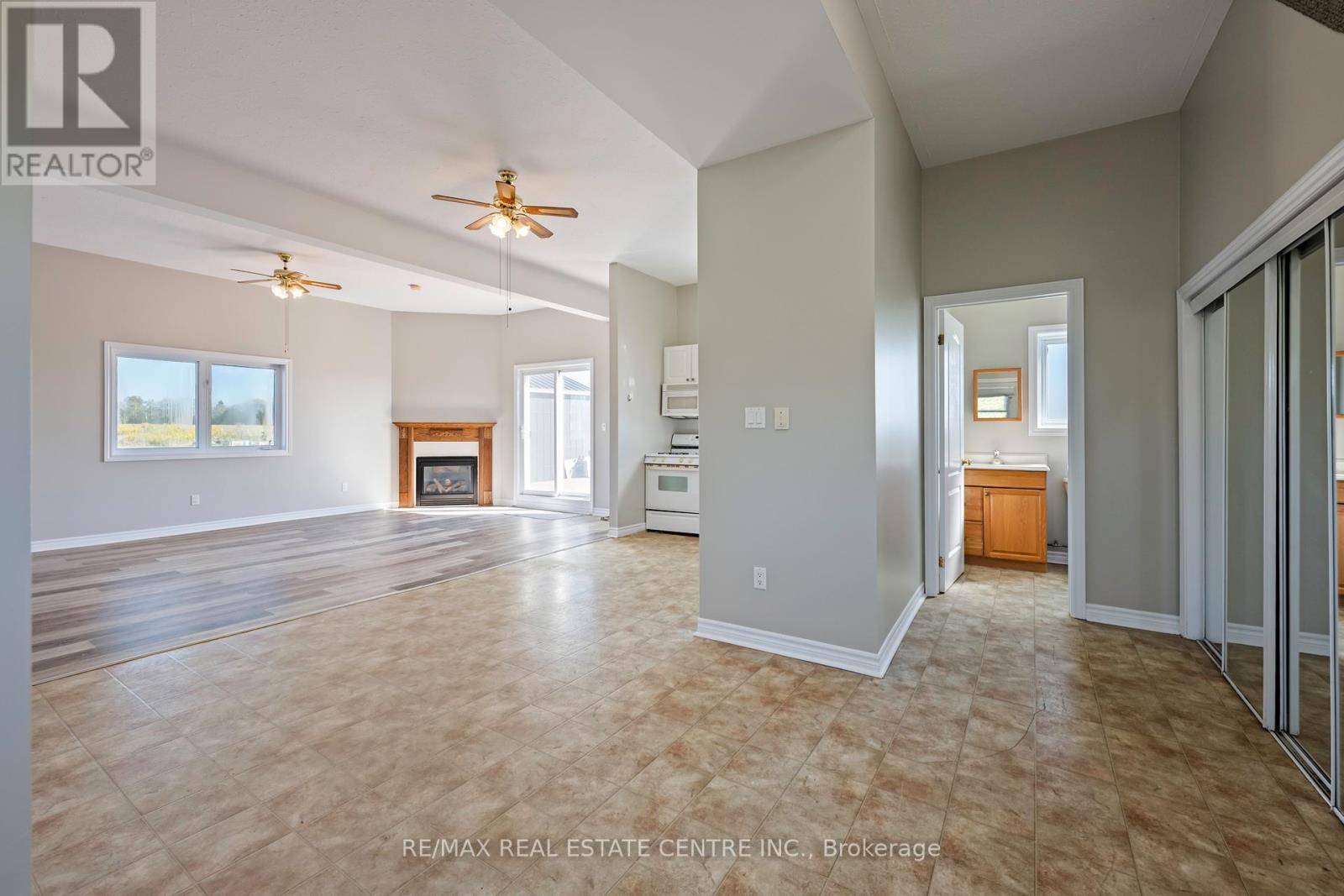 395115 County Road 12 Road, Amaranth, ON - Indoor Photo Showing Other Room With Fireplace