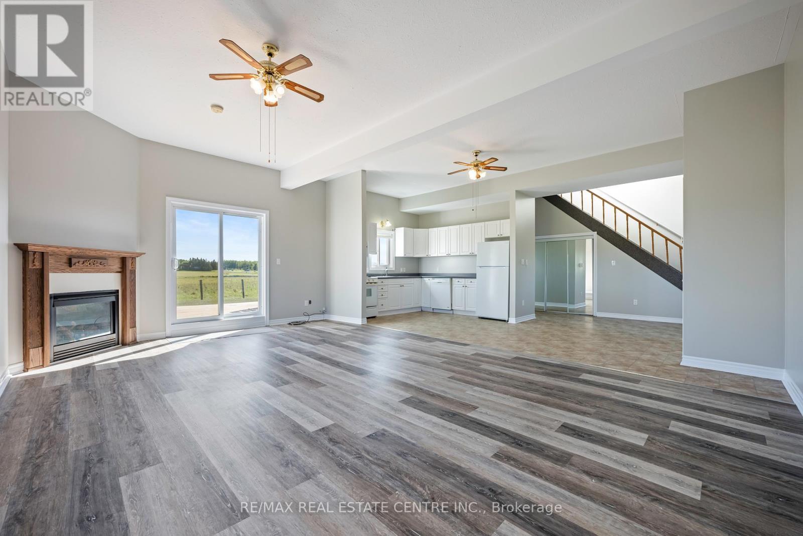 395115 County Road 12 Road, Amaranth, ON - Indoor Photo Showing Living Room With Fireplace
