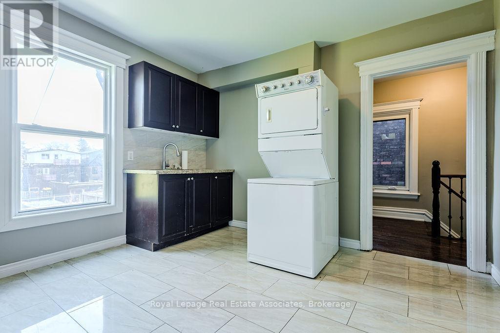 Upper - 19 Sanford Avenue S, Hamilton, ON - Indoor Photo Showing Laundry Room