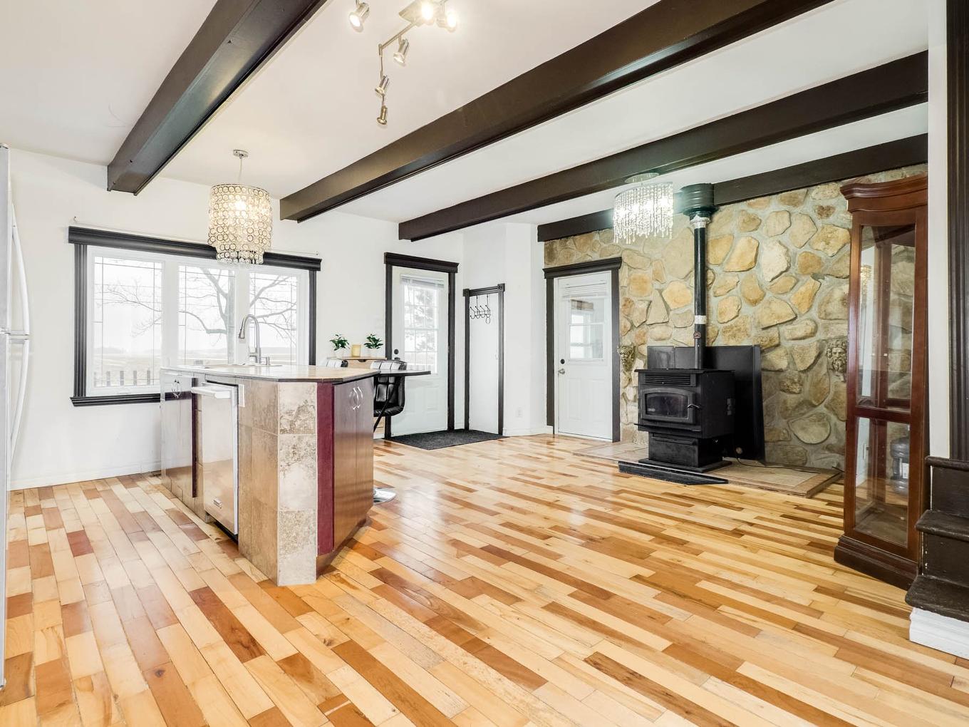 Kitchen - 31 Rg Du Quarante, Saint-Louis-De-Gonzague, QC - Indoor With Fireplace
