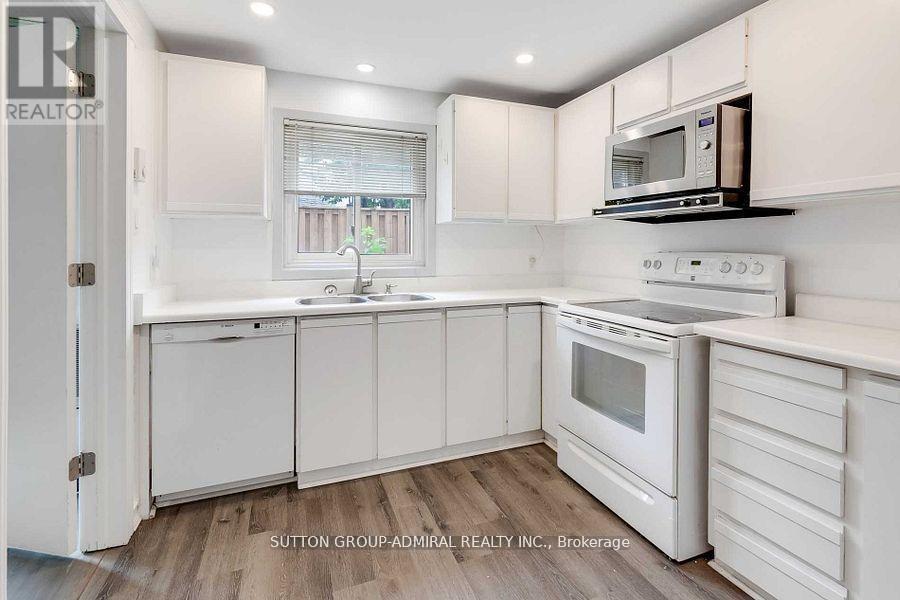 143 Torresdale Avenue, Toronto, ON - Indoor Photo Showing Kitchen With Double Sink