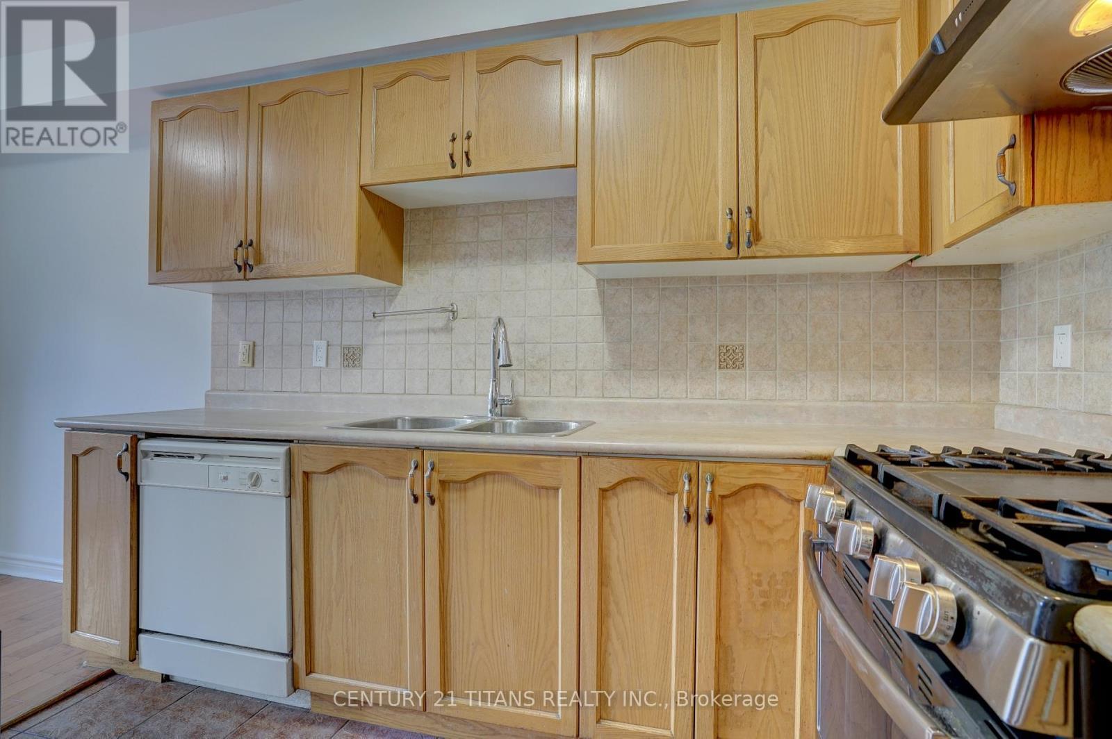 97 Triple Crown Avenue, Toronto, ON - Indoor Photo Showing Kitchen With Double Sink