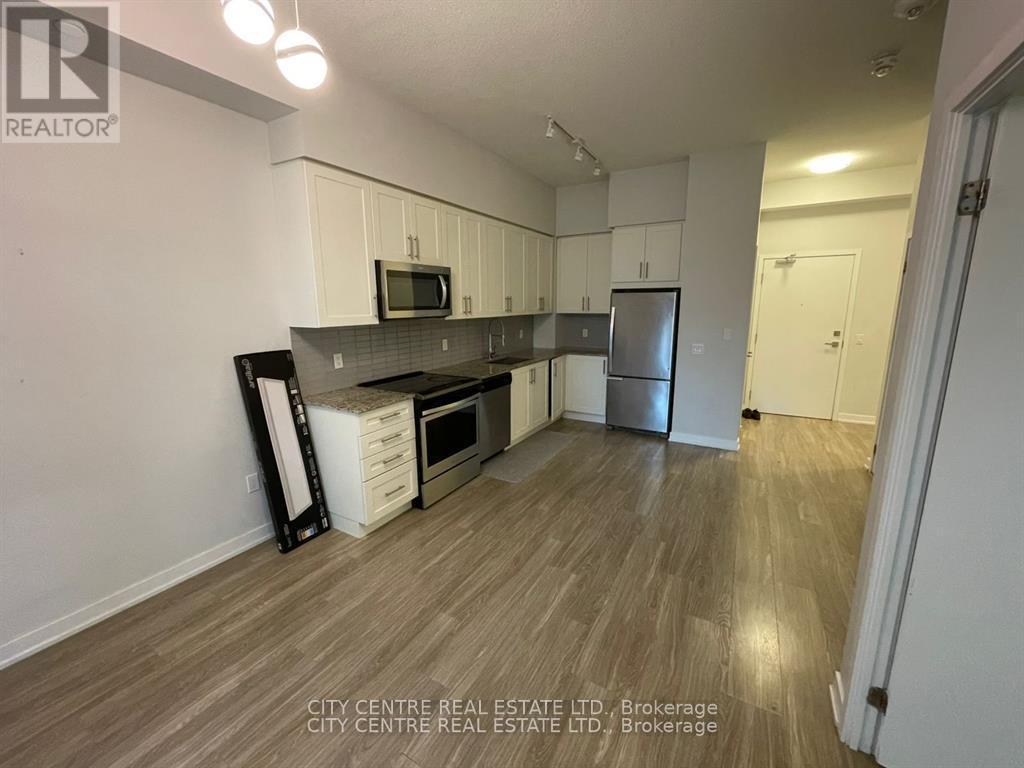 609 - 4085 Parkside Village Drive, Mississauga, ON - Indoor Photo Showing Kitchen With Stainless Steel Kitchen