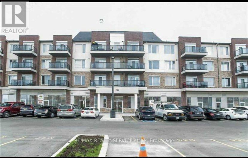 209 - 50 Sky Harbour Drive W, Brampton, ON - Outdoor With Balcony With Facade