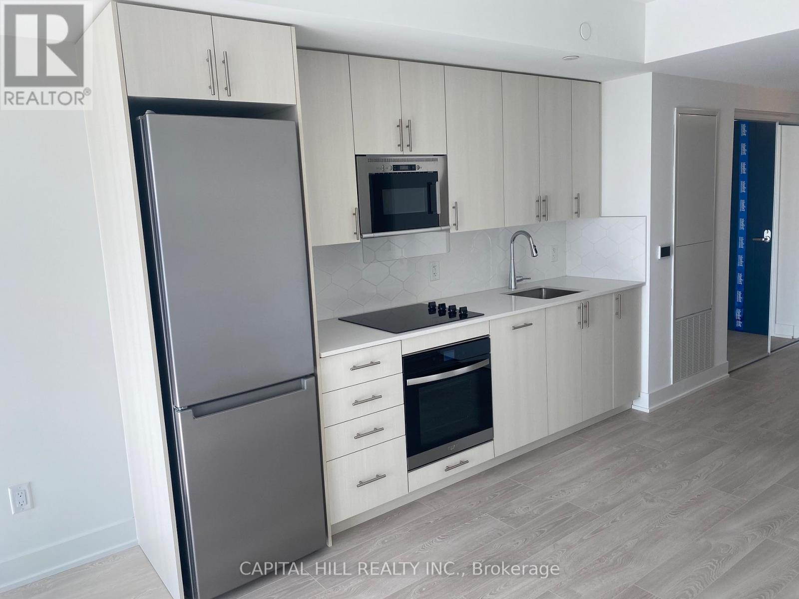 739 - 2425 Simcoe Street N, Oshawa, ON - Indoor Photo Showing Kitchen