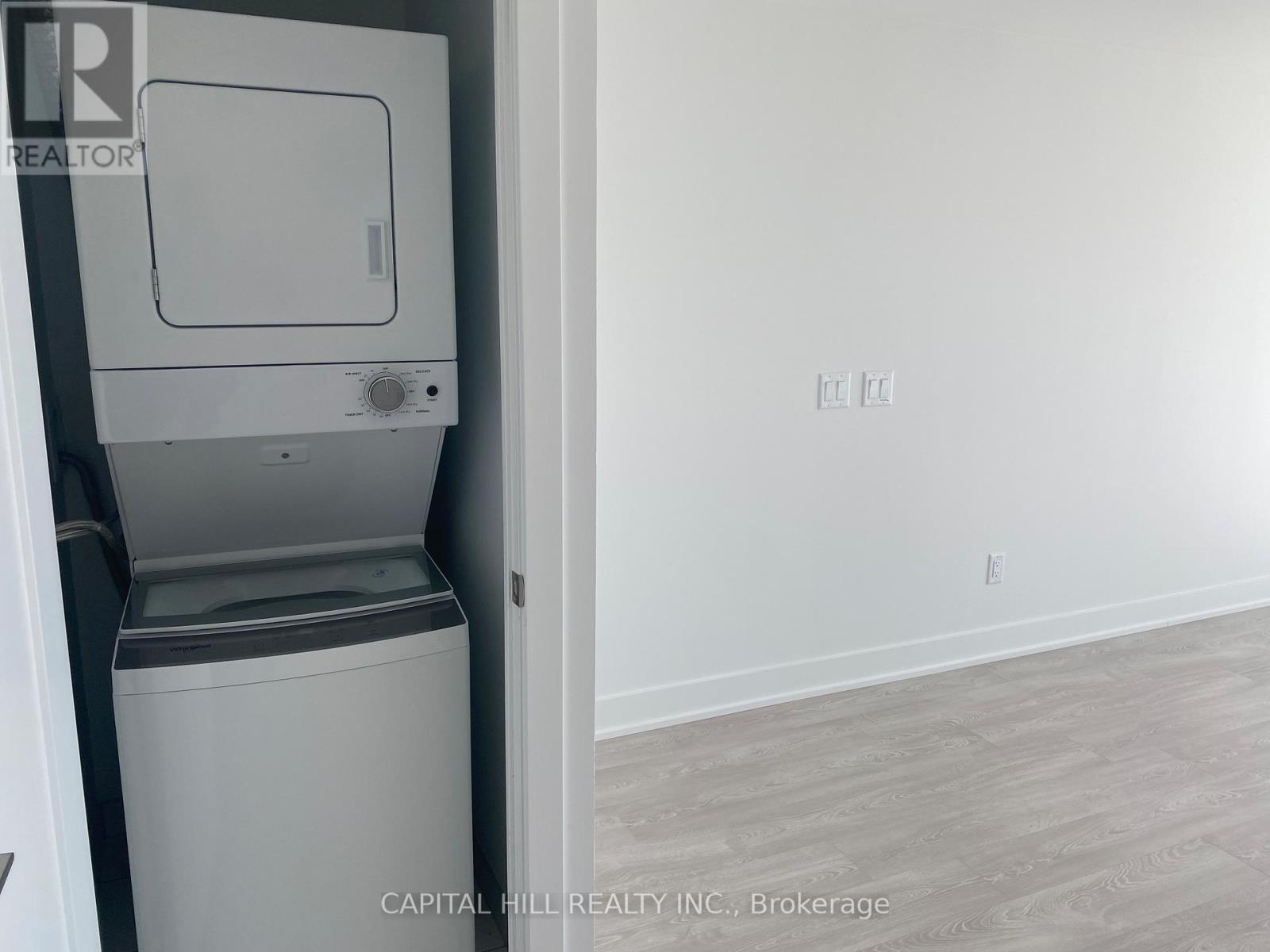 739 - 2425 Simcoe Street N, Oshawa, ON - Indoor Photo Showing Laundry Room