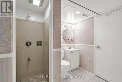 Walk-in shower in basement bathroom. -