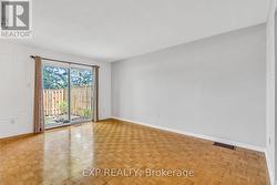 Walk-out to private backyard. -