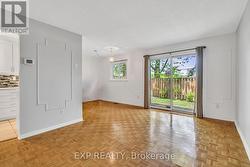 Open concept living and dining area. -