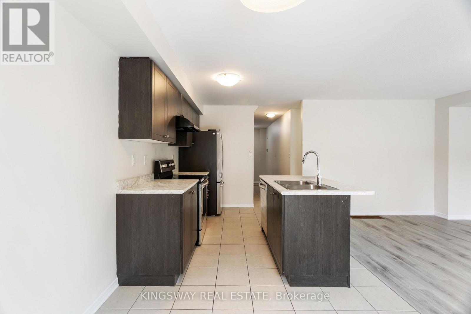 125 Thompson Road, Haldimand, ON - Indoor Photo Showing Kitchen With Double Sink
