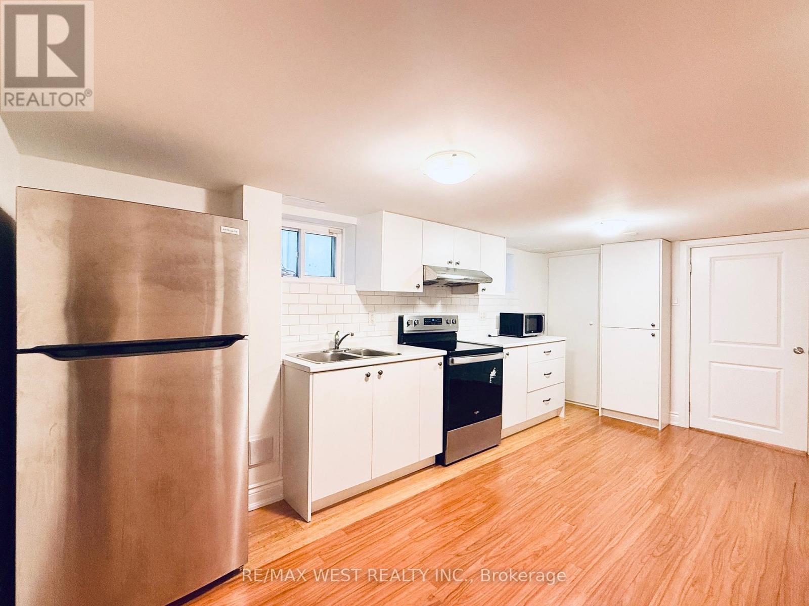 Lower - 43 Dunblaine Avenue, Toronto, ON - Indoor Photo Showing Kitchen With Double Sink