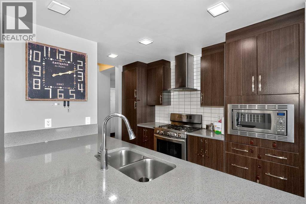 45 Redstone Drive Ne, Calgary, AB - Indoor Photo Showing Kitchen With Double Sink