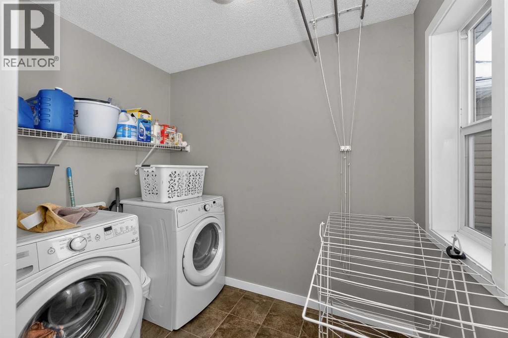 45 Redstone Drive Ne, Calgary, AB - Indoor Photo Showing Laundry Room