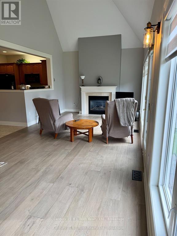 16 - 5 Invermara Court, Orillia, ON - Indoor Photo Showing Other Room With Fireplace