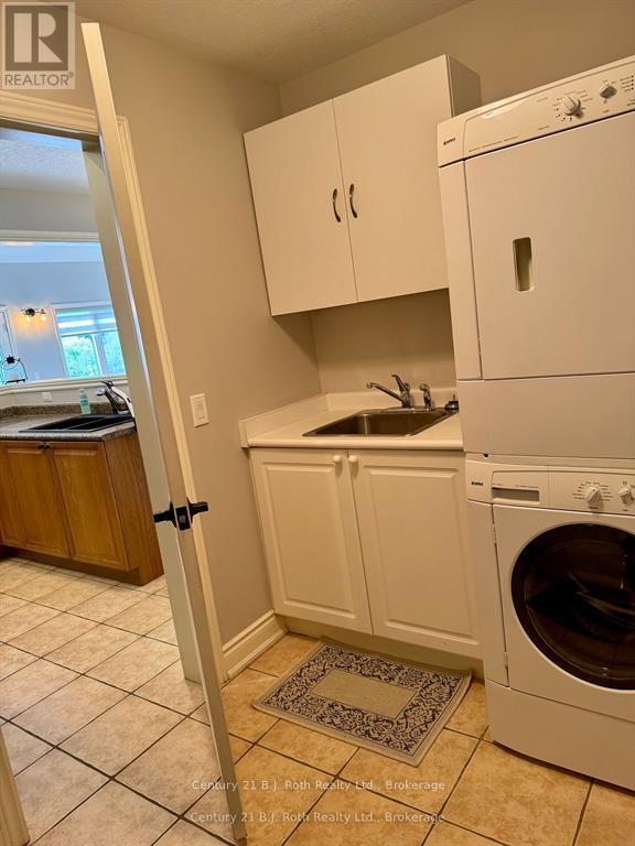 Main Floor Laundry - 16 - 5 Invermara Court, Orillia, ON - Indoor Photo Showing Laundry Room