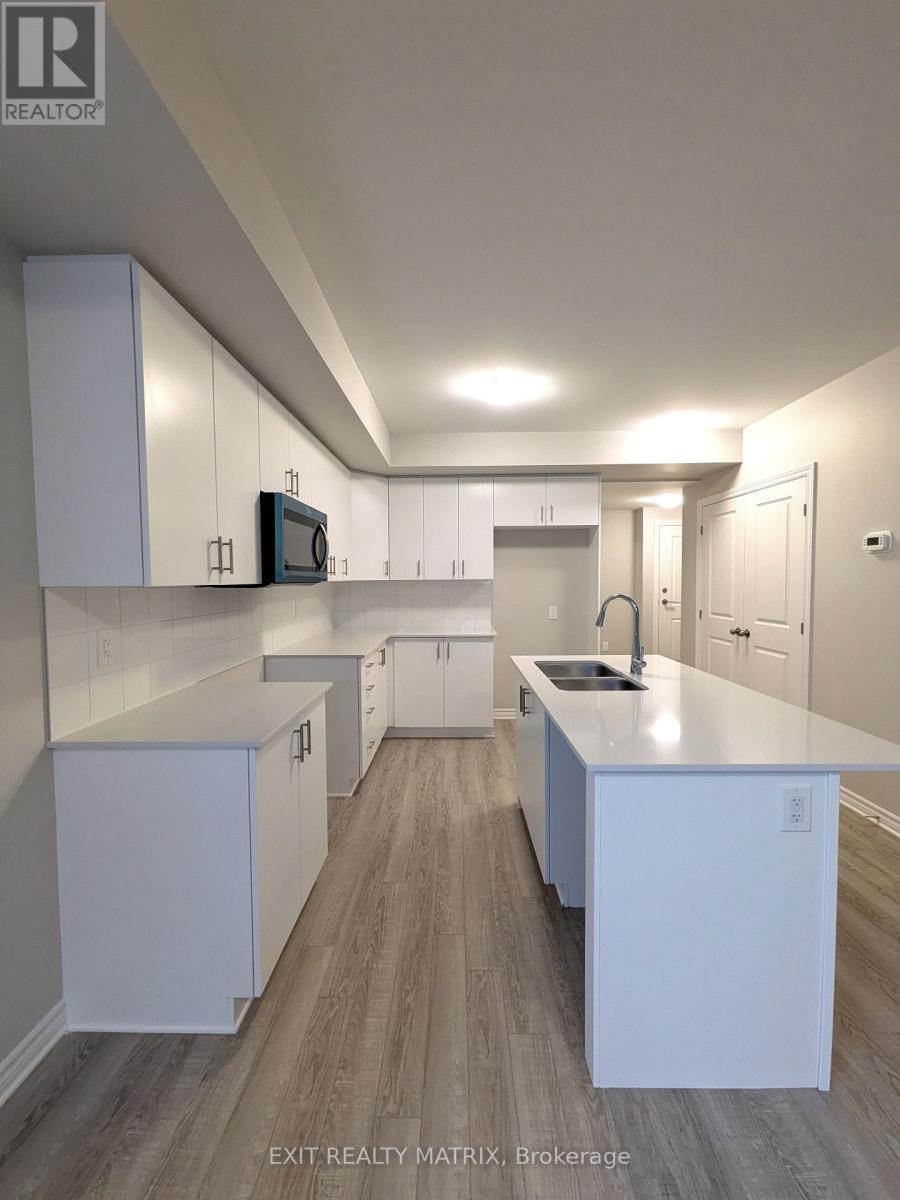 903 Cologne Street, Russell, ON - Indoor Photo Showing Kitchen With Double Sink