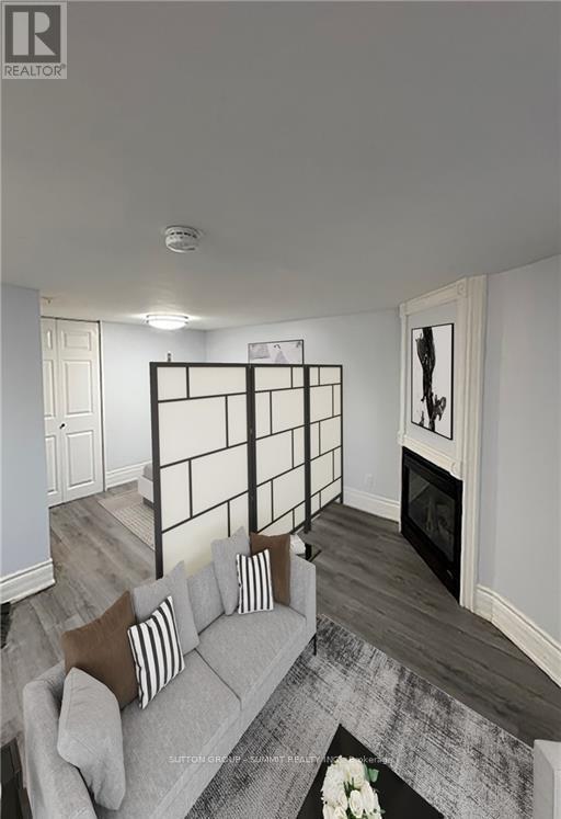 9 - 75 Mcintyre Crescent, Halton Hills, ON - Indoor Photo Showing Living Room With Fireplace