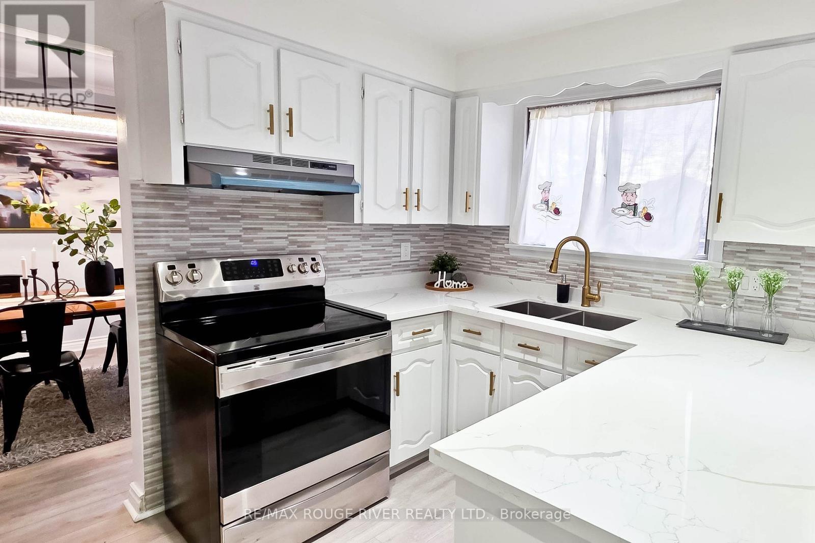 22 Annabelle Drive, Toronto, ON - Indoor Photo Showing Kitchen With Stainless Steel Kitchen With Double Sink With Upgraded Kitchen