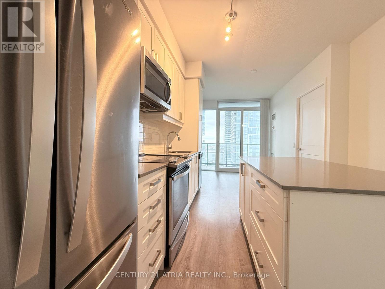 1711 - 7895 Jane Street, Vaughan, ON - Indoor Photo Showing Kitchen With Upgraded Kitchen