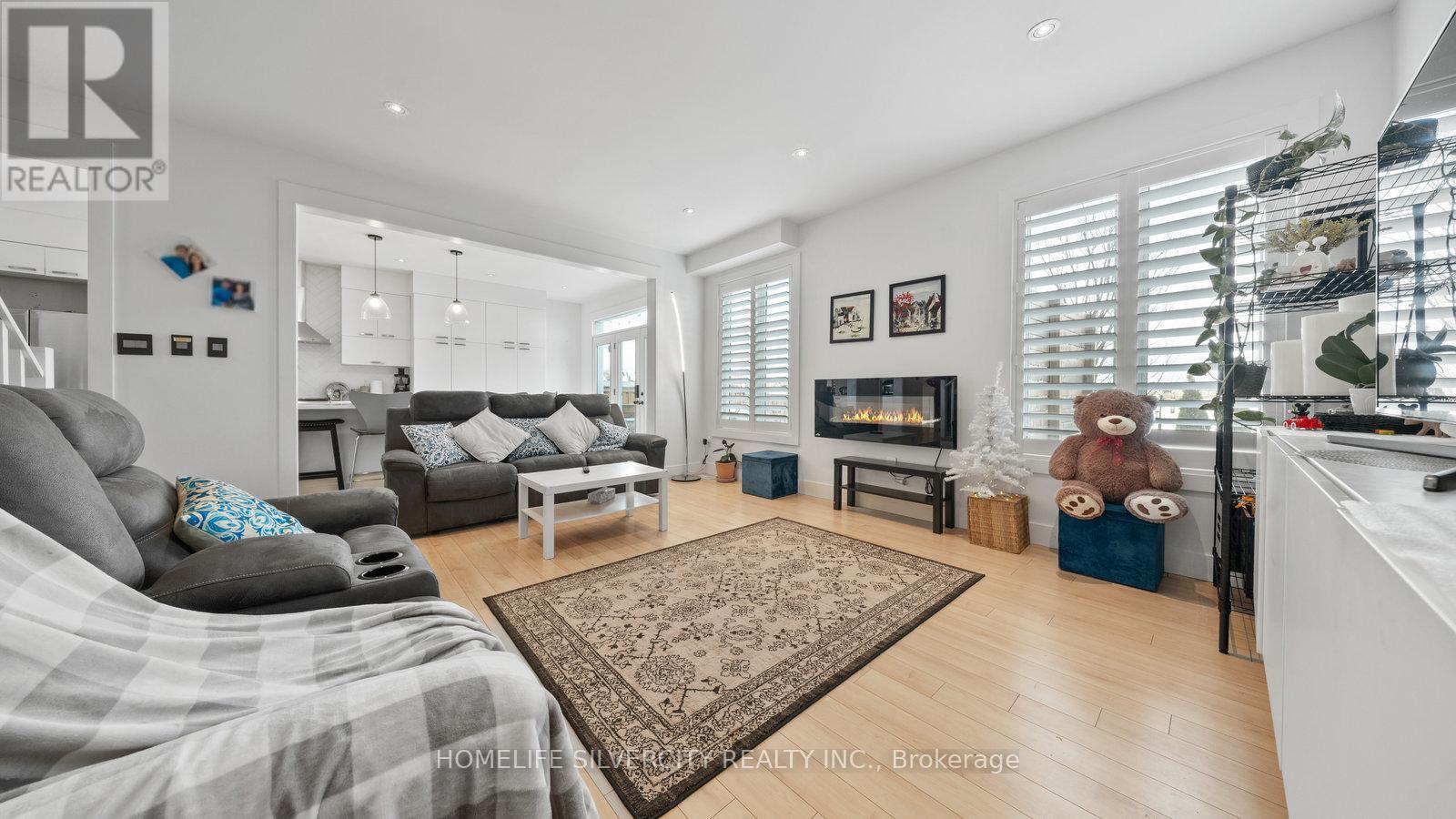 93 Gillespie Drive, Brantford, ON - Indoor Photo Showing Living Room With Fireplace