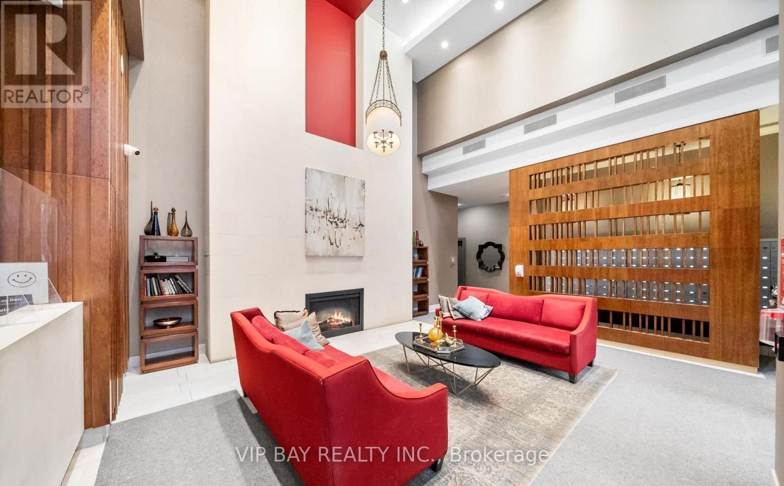 1708 - 18 Kenaston Gardens, Toronto, ON - Indoor With Fireplace