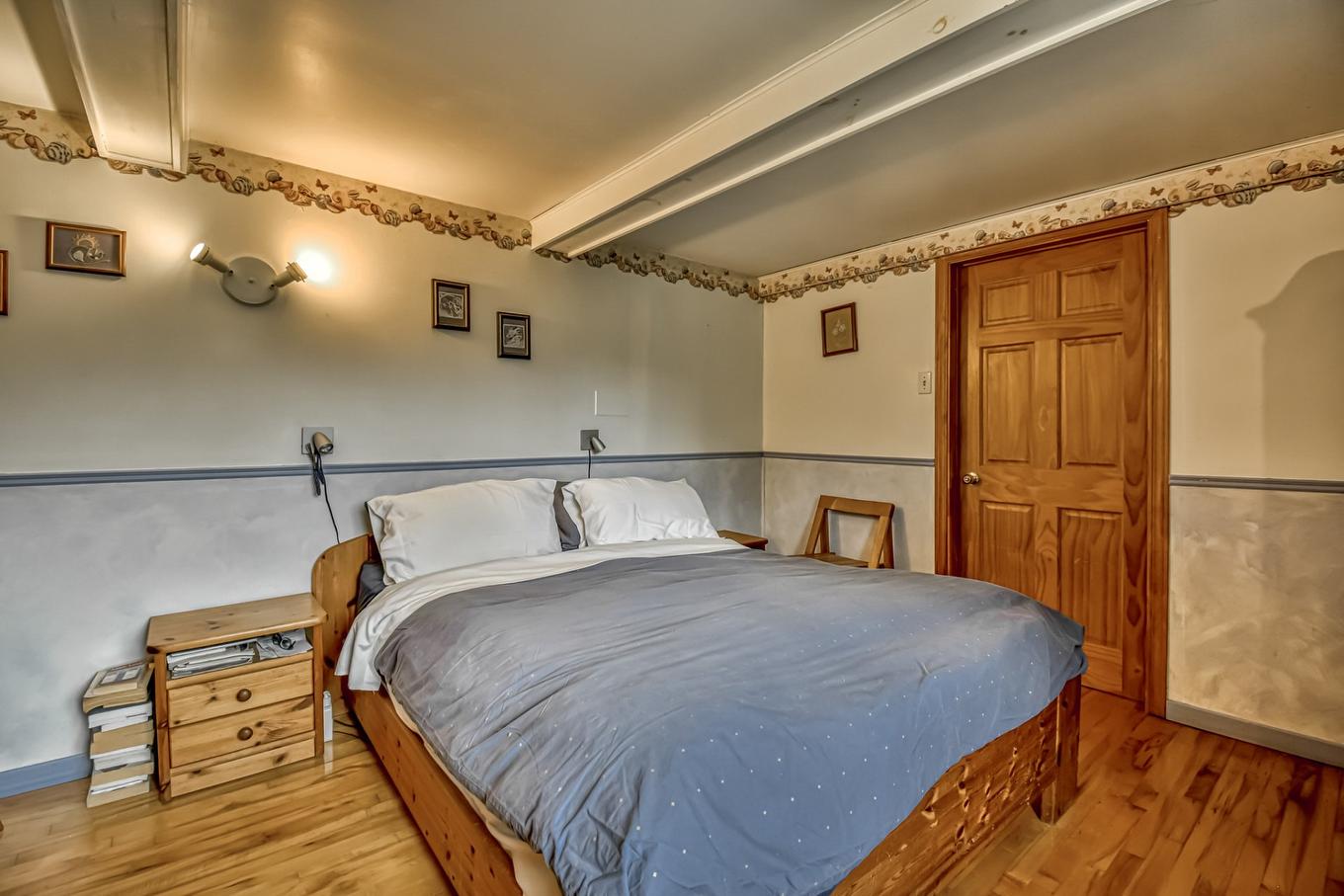 Chambre à coucher principale - 150 Ch. Guénette, Sainte-Marguerite-Du-Lac-Masson, QC - Indoor Photo Showing Bedroom